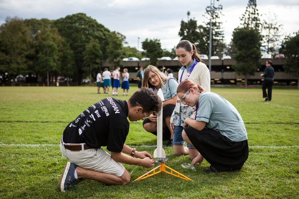 students setting up a rocket