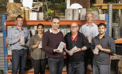 (L-R) GCP Applied Techologies' Niki Jackson, Masters student Sai Manaswi Reddy, Dr Mehdi Serati, UQ's Shane Walker, Aurecon's Dr Harry Asche, Masters student Gautam Malgotra in the UQ laboratory