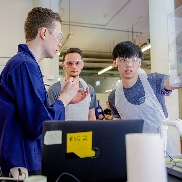 Three students in a lab