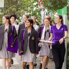 Group of young women walking together