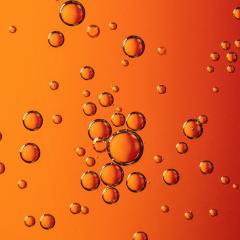 An elongated (Taylor) bubble rising through a simplified natural gas well with the development of a trailing liquid slug.