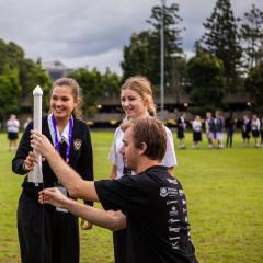 High school students build and launch a rocket at the UQ WE Explore event. 