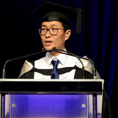 student standing at podium