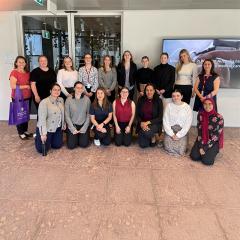 Group of students and engineers at Rio Tinto's office.