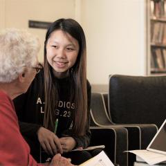 Researcher interviewing Retirement Village resident