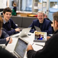 CBA project lead Michael Smith (centre) with the LendX students, including BEL and EAIT student Tara O'Kane, who Skyped in from the USA. 