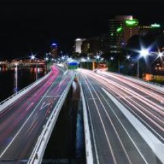 high-speed photograph of motorway at night