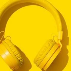 yellow headphones on yellow background